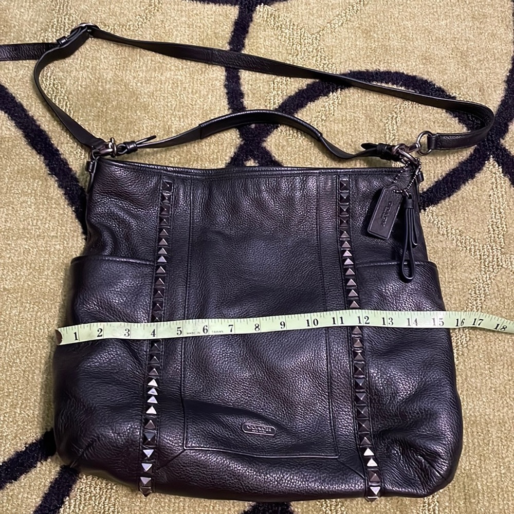 Coach “Park Pyramid Stud Leather Hobo” bag